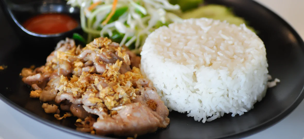 Stir-Fried Smoked Pork with Garlic Scapes (La Rou Chao Suan Miao)