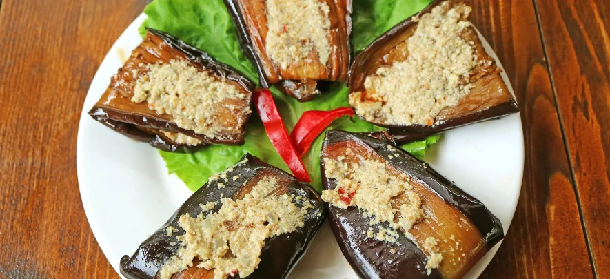 12. Badrijani Nigvzit (Eggplant with Walnut Paste)